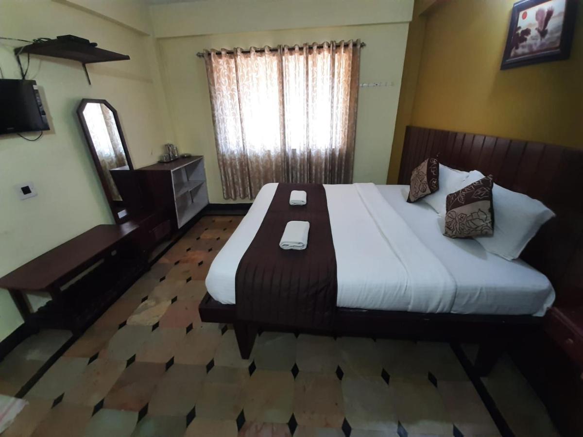 Hotel Caveri Comfort Inn Madikeri Luaran gambar