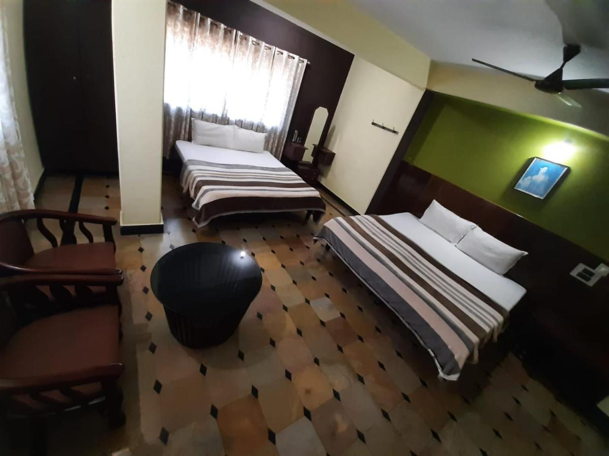Hotel Caveri Comfort Inn Madikeri Luaran gambar