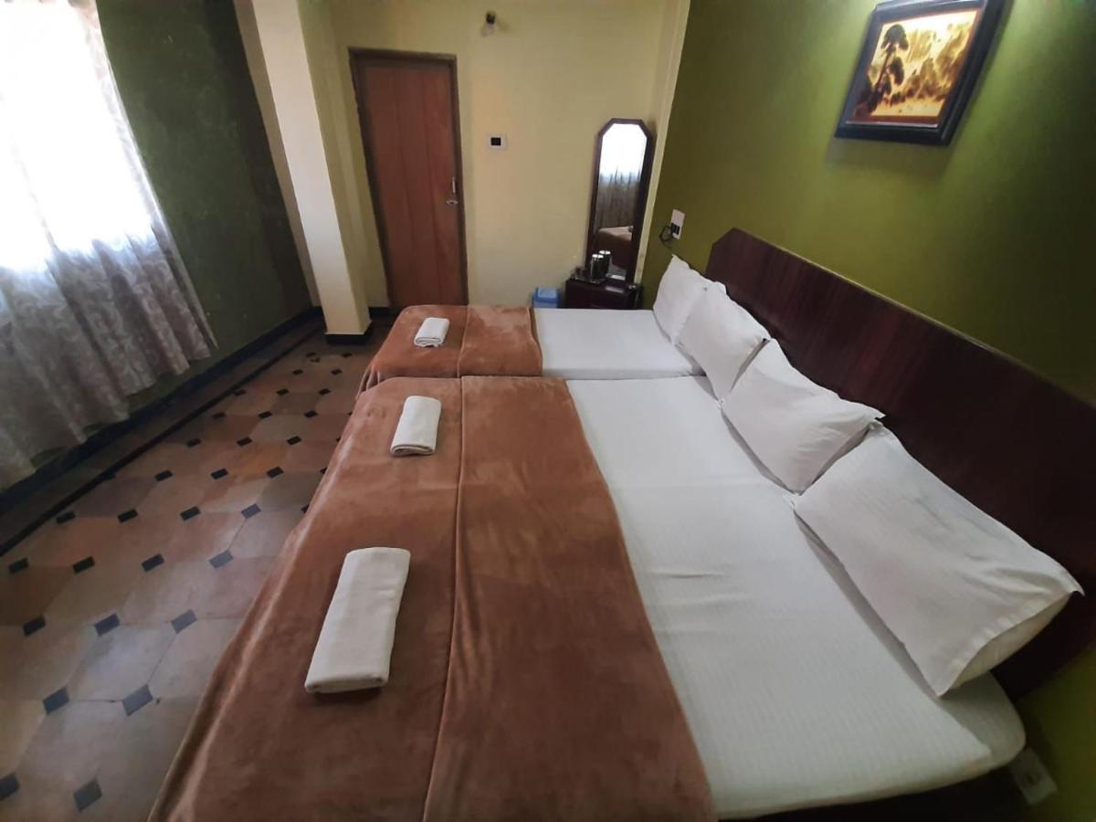 Hotel Caveri Comfort Inn Madikeri Luaran gambar